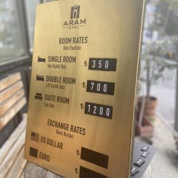 Aram Hotel Room Rates Board